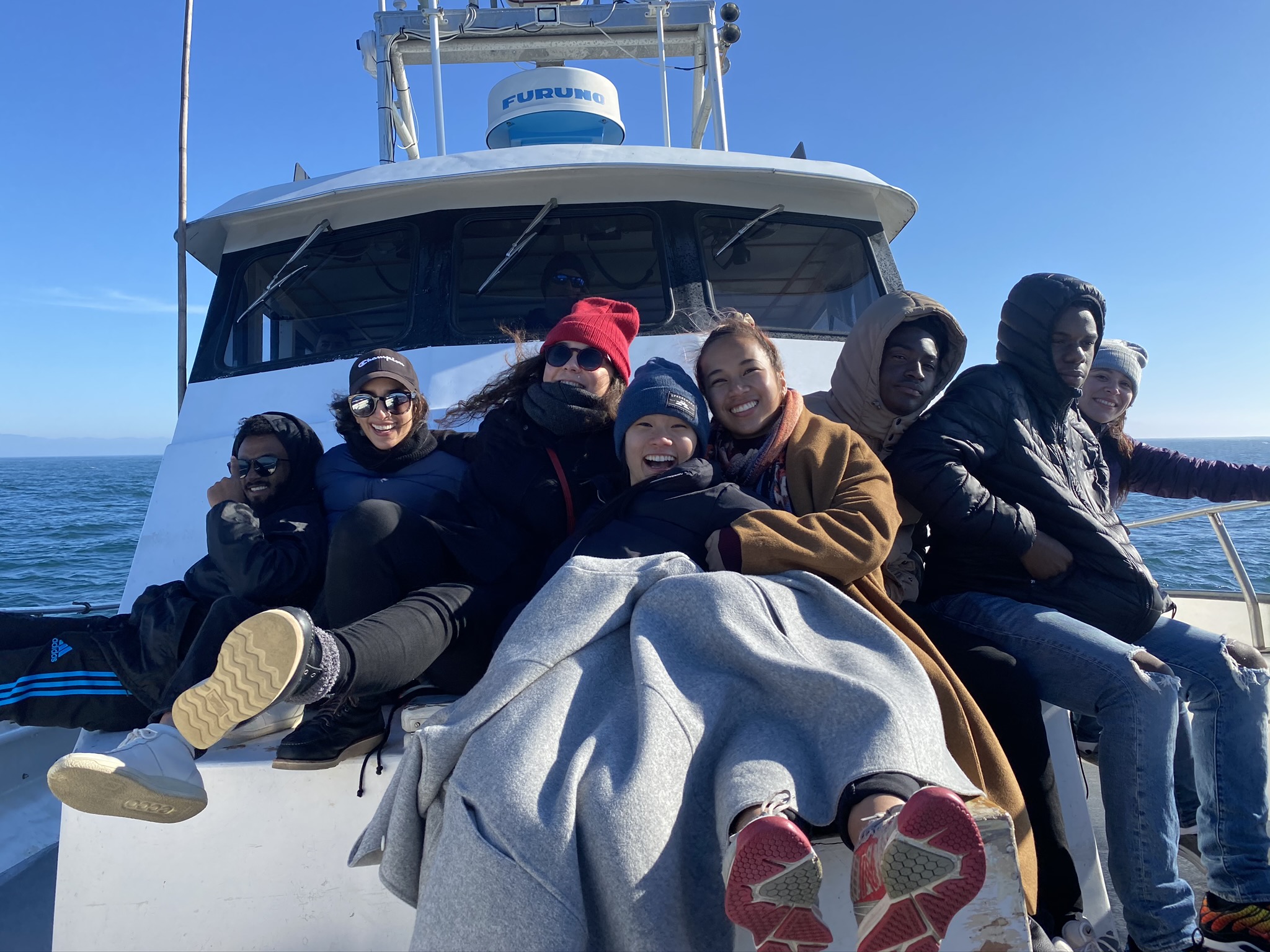 students on the boat while whale watching