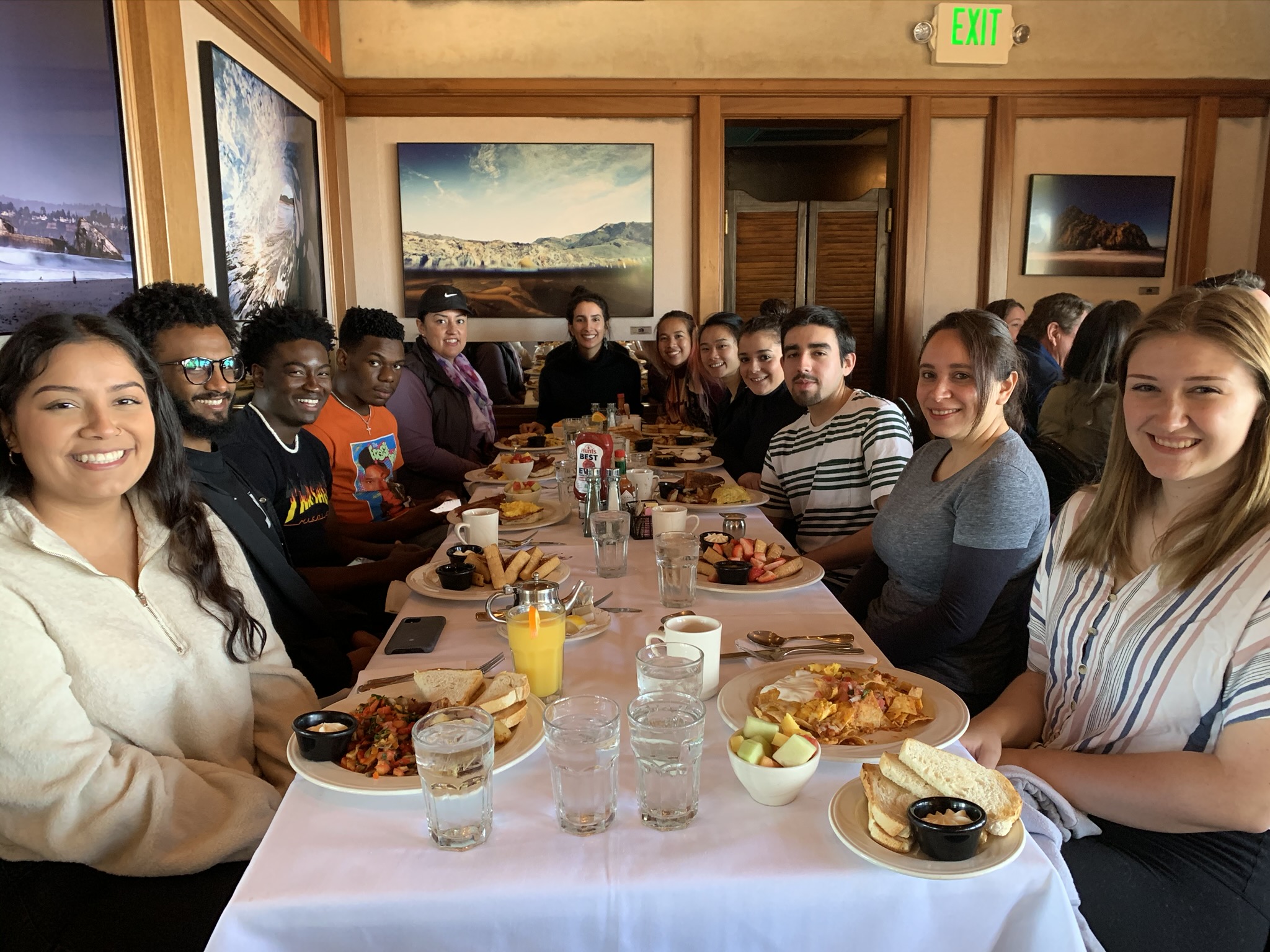 scholars eating lunch after whale watching